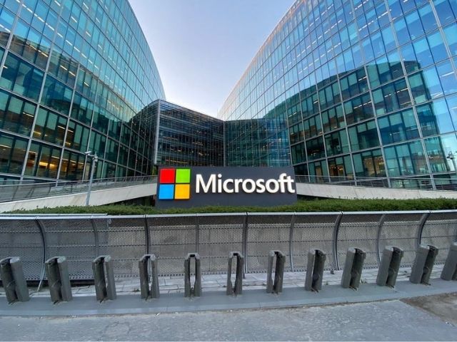 Woman working on laptop with Google interface